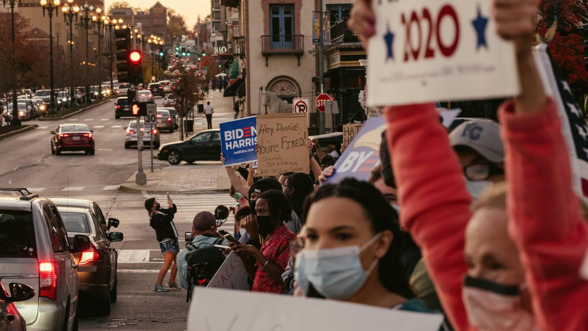 Kansas Citians gathered Nov. 7 at Mill Creek Park near the Country Club Plaza to celebrate Joe Biden becoming the 46th President of the United States. (Chase Castor/The Beacon)