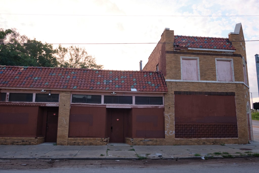 This property at 3855 Woodland Ave. is on Kansas City's dangerous buildings list. The property owner is located in Mission, Kansas.
