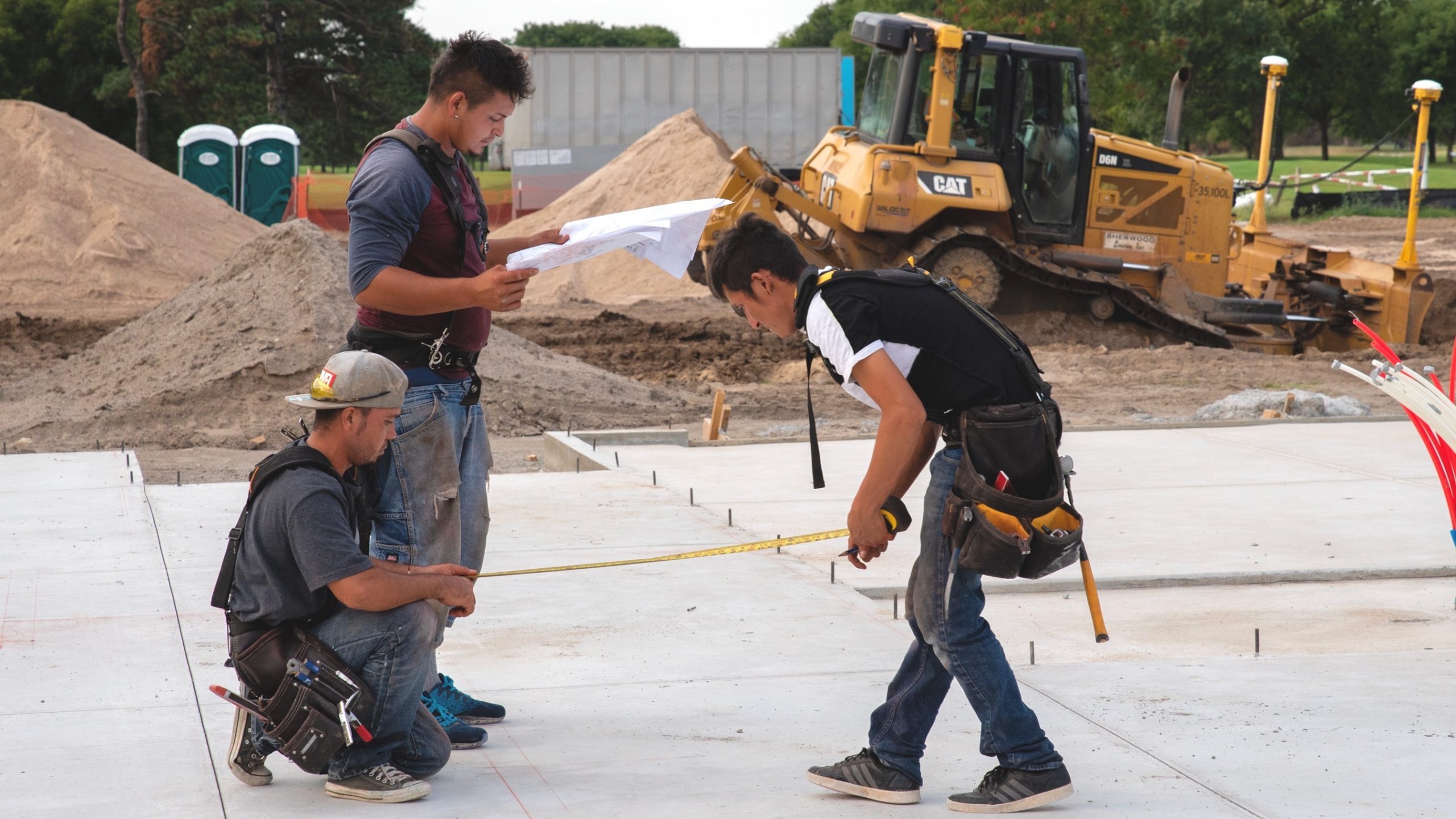 A construction crew works on the foundation for one of the first 40 houses in the Riverside Housing Redevelopment District. (Alex Unruh/The Beacon)