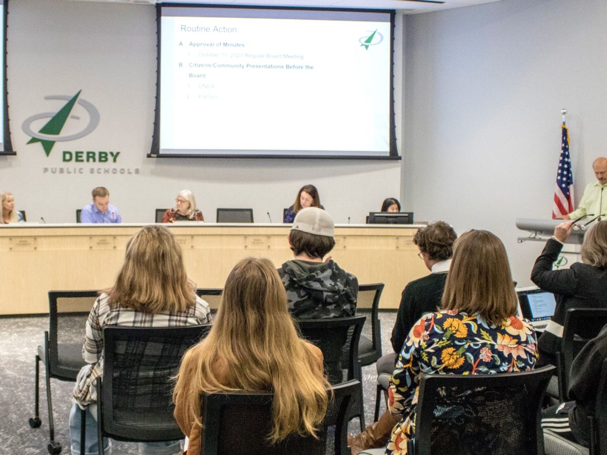 The Derby Board of Education listens to a member of the public during its meeting on Monday.