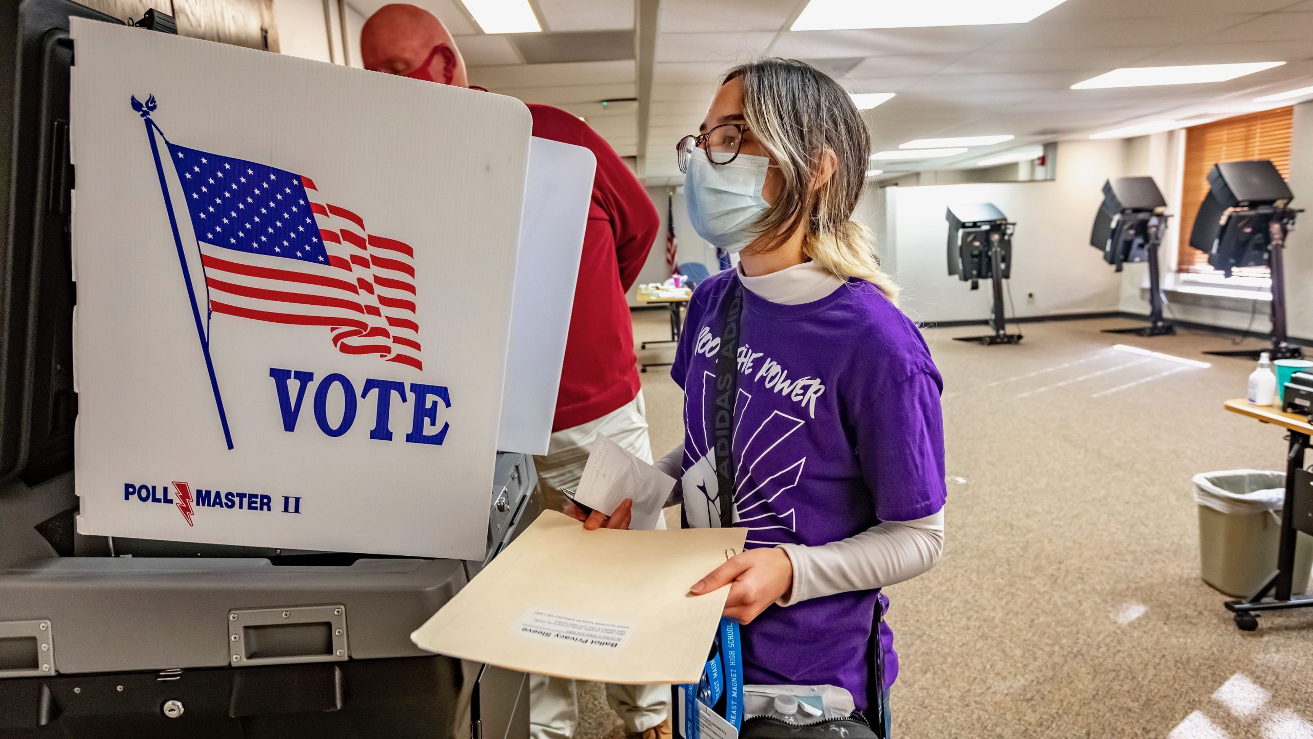 Root the Power member Dione Ramos voted for the first time Tuesday at the Historic County Courthouse in downtown Wichita.