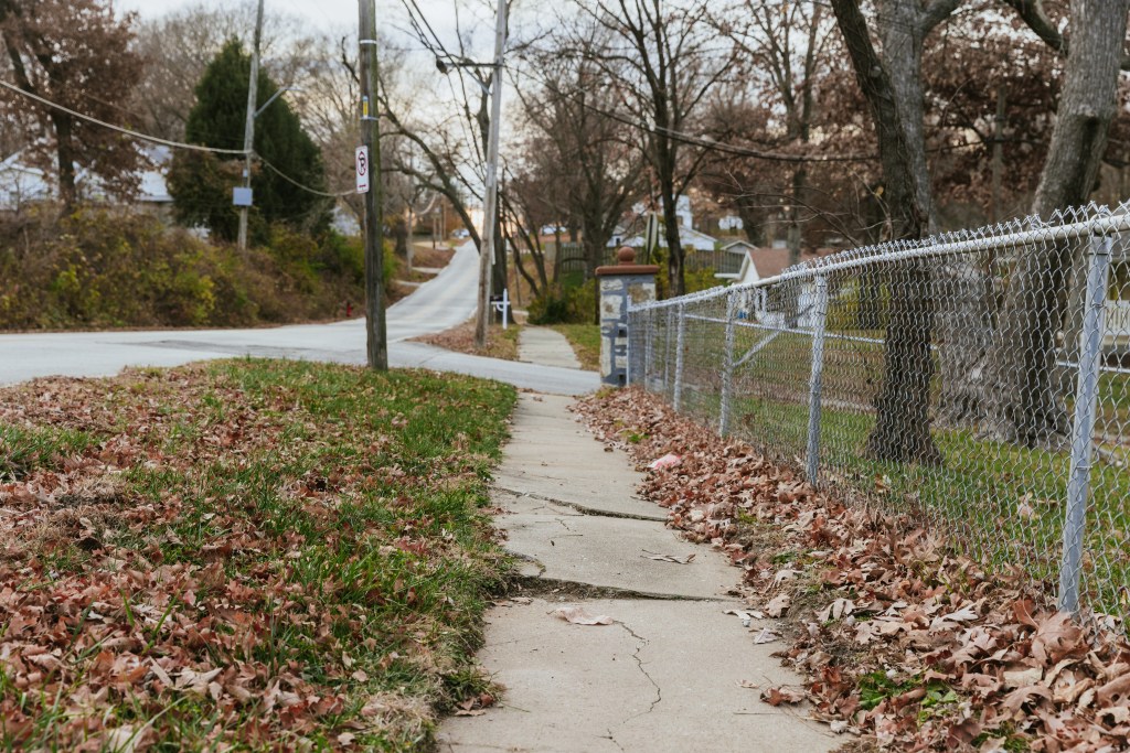 Damage on one of the few sidewalks in Madison Hays’ neighborhood located south of Barry Road.