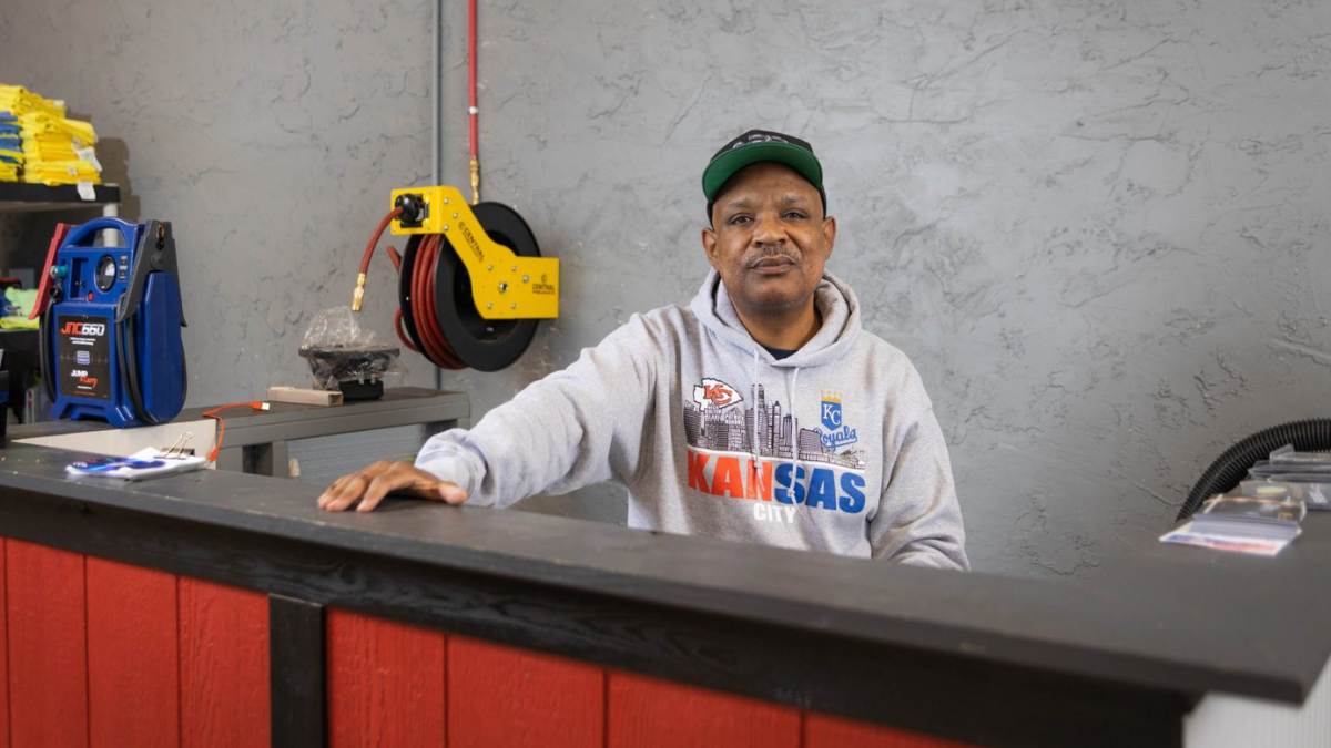 Jyan harris working in his detailing shop.