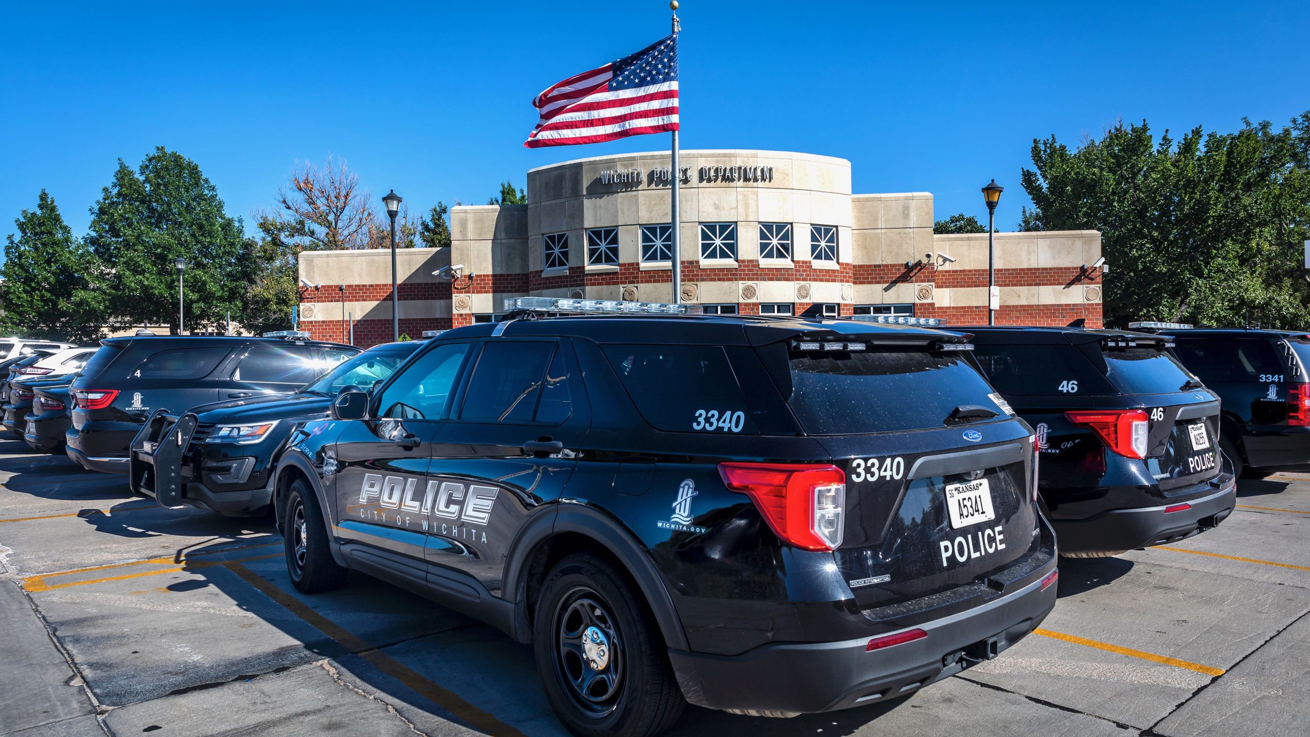 City of Wichita police vehicles in front of the police department.