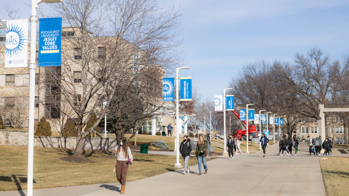 Students walk on the campus of Rockhurst University on Jan. 25 in Kansas City. The Jesuit, Catholic school is one of only a few KC-area colleges or universities to require students to be vaccinated.