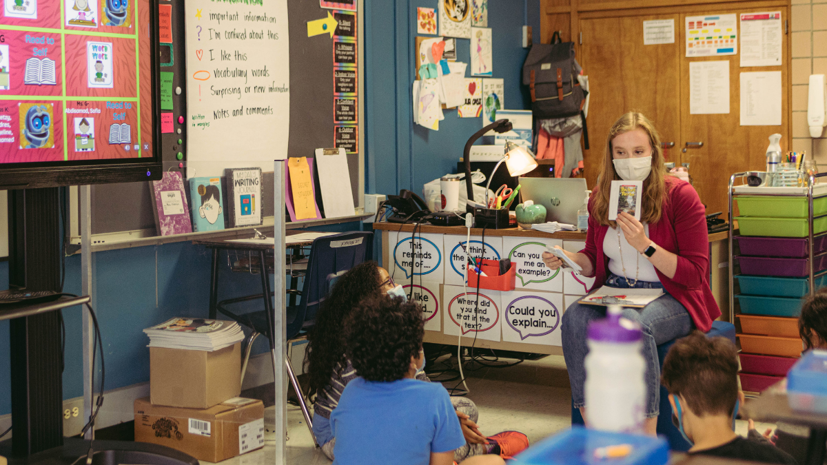 A Missouri teacher works with students at Garfield Elementary