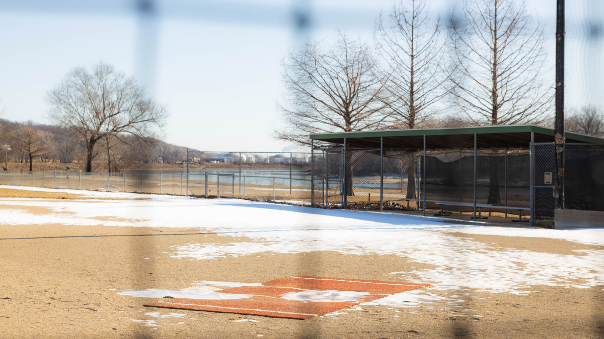 An empty softball field sits unused in English Landing Park