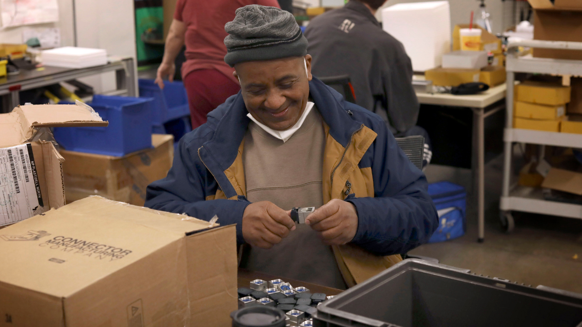 Chris “Bucky” Robinson putting together lug nuts