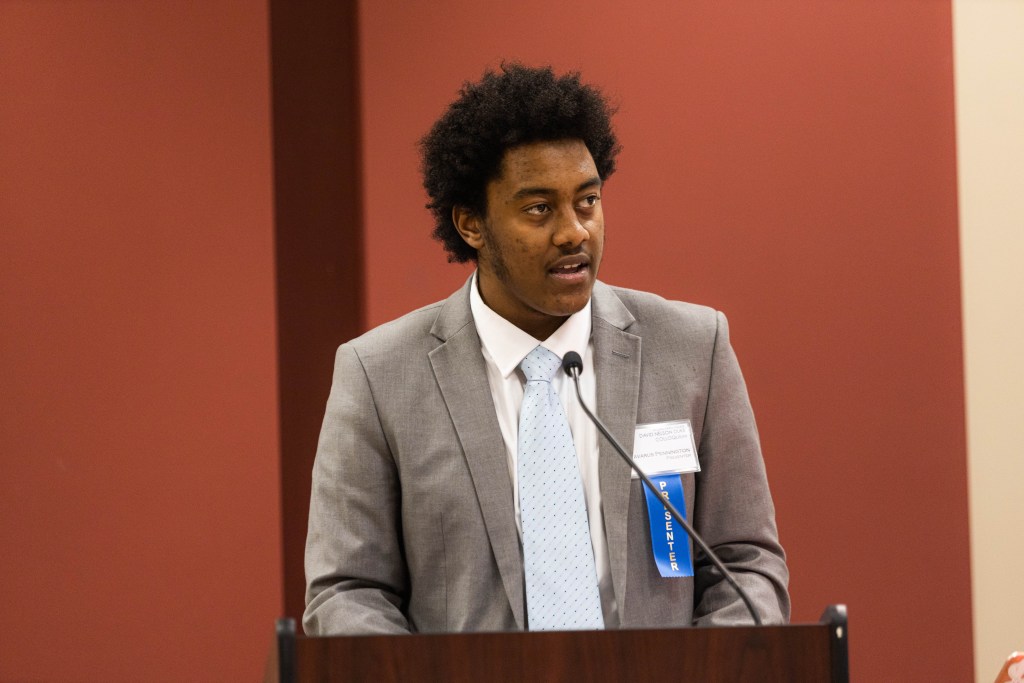 Senior English and communications major Tavarus Pennington speaks at the Duke Colloquium on April 22 at Yates-Gill College Union on the William Jewell College campus. Pennington was the third Slavery, Memory and Justice Project member to present, speaking on "How a Slaveholding Past Shapes Jewell's Future."