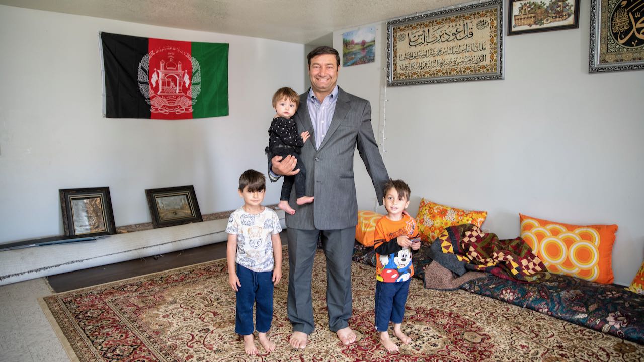 Abdul Satar with his three children