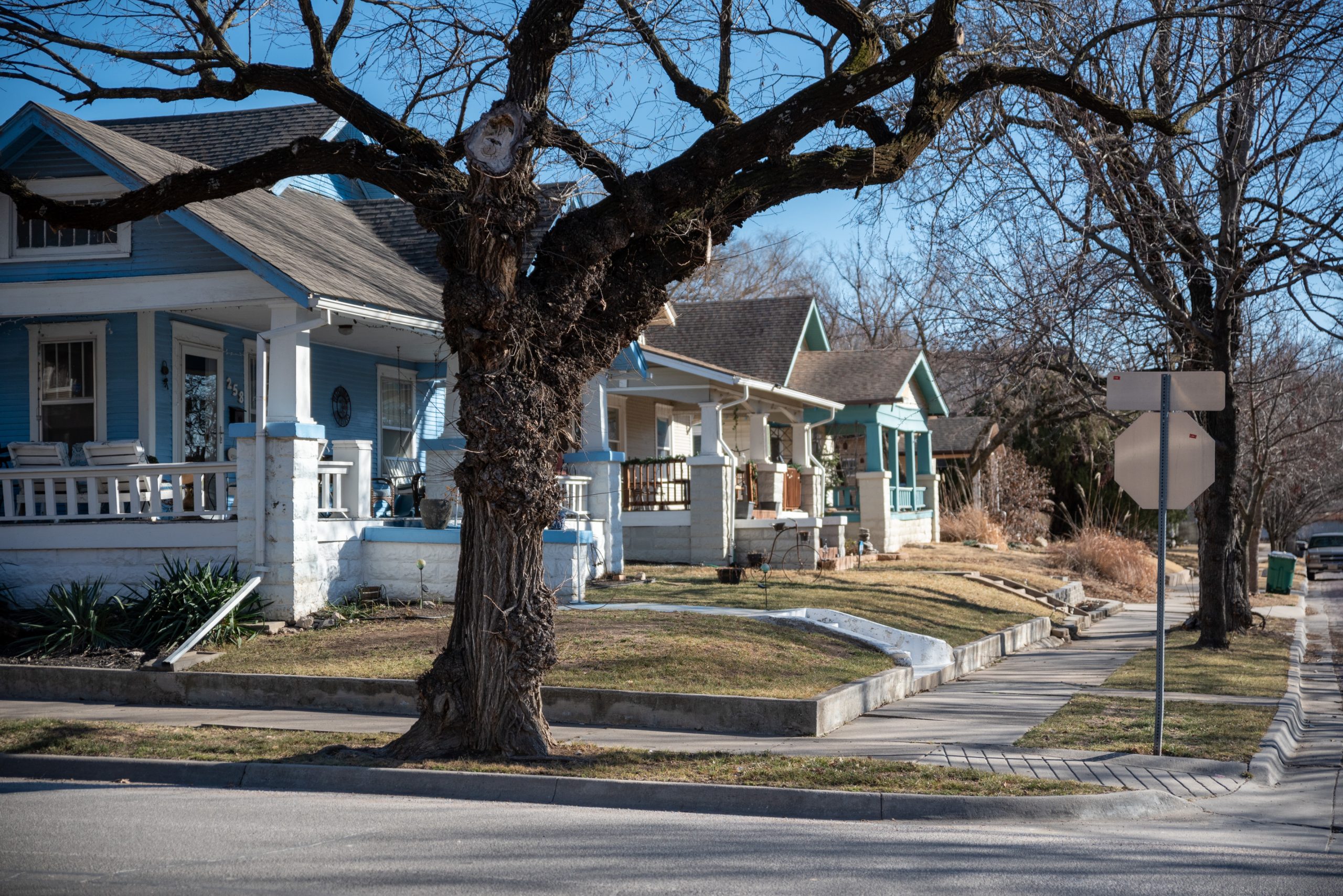A tree lined street in Wichita illustrates Kansas homeowner assistance