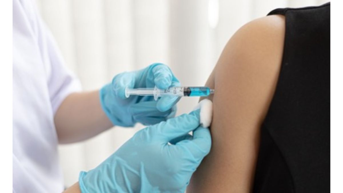 Image of doctor inoculating a patient