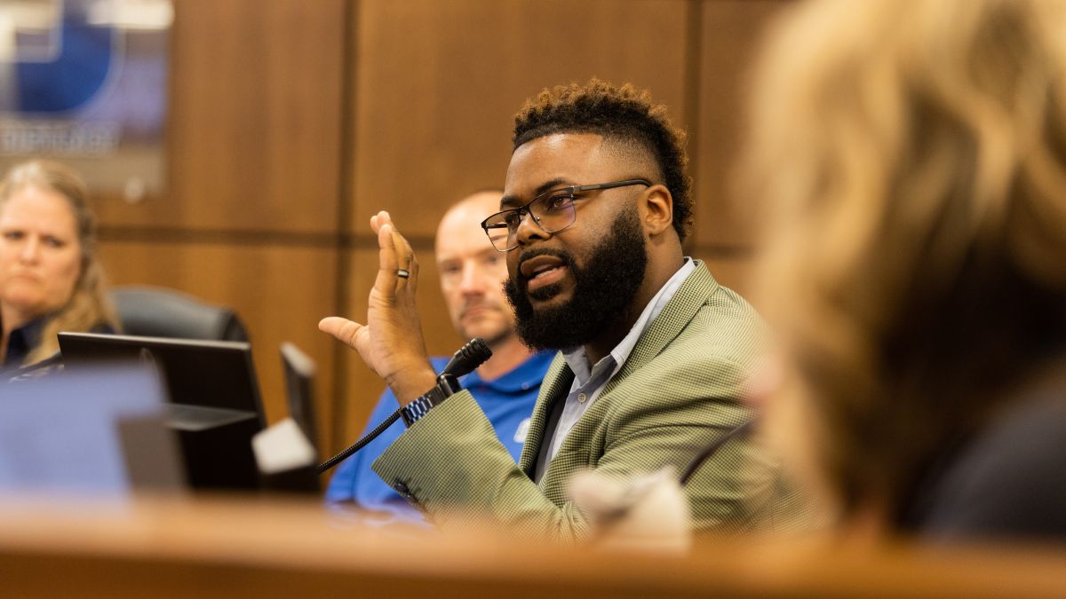 An Independence school board member gestures