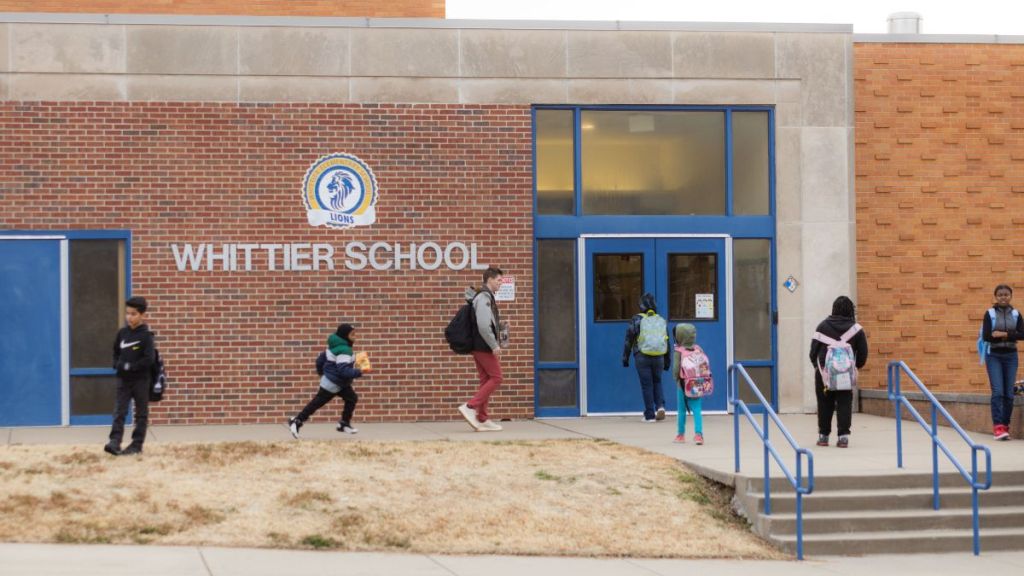 Children walk toward Whittier Elementary School