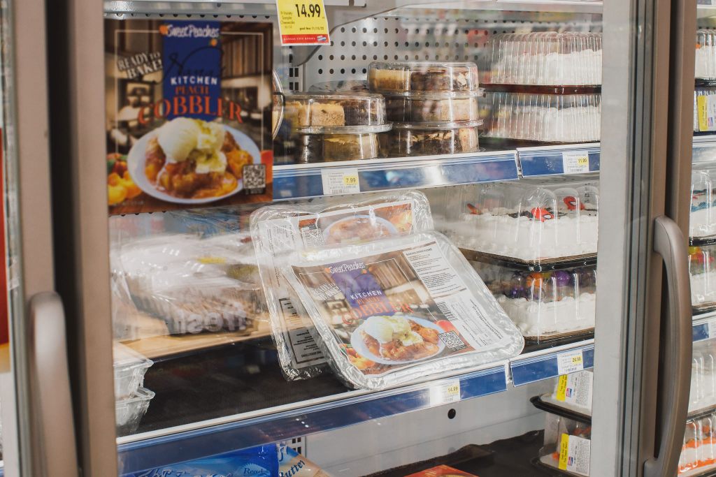 A photo of ready to bake Sweet Peaches Cobblers in the freezer at Price Chopper