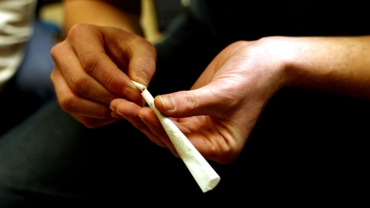 A person rolls a marijuana joint in a file photo.