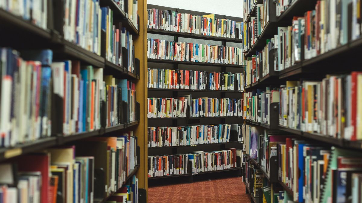 A library is pictured in a stock photo.