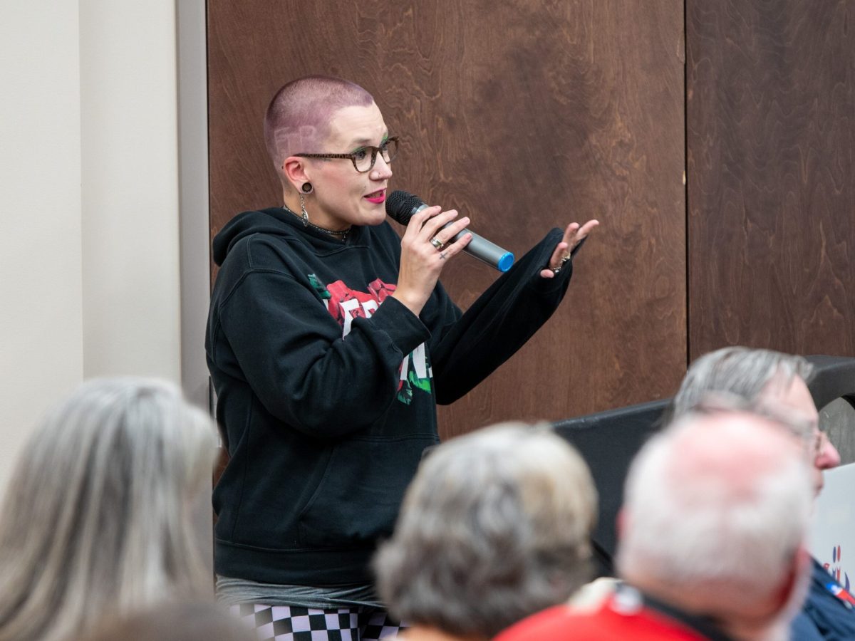 Jessica Blackburn speaks to south central members of the Kansas Legislature at a public forum