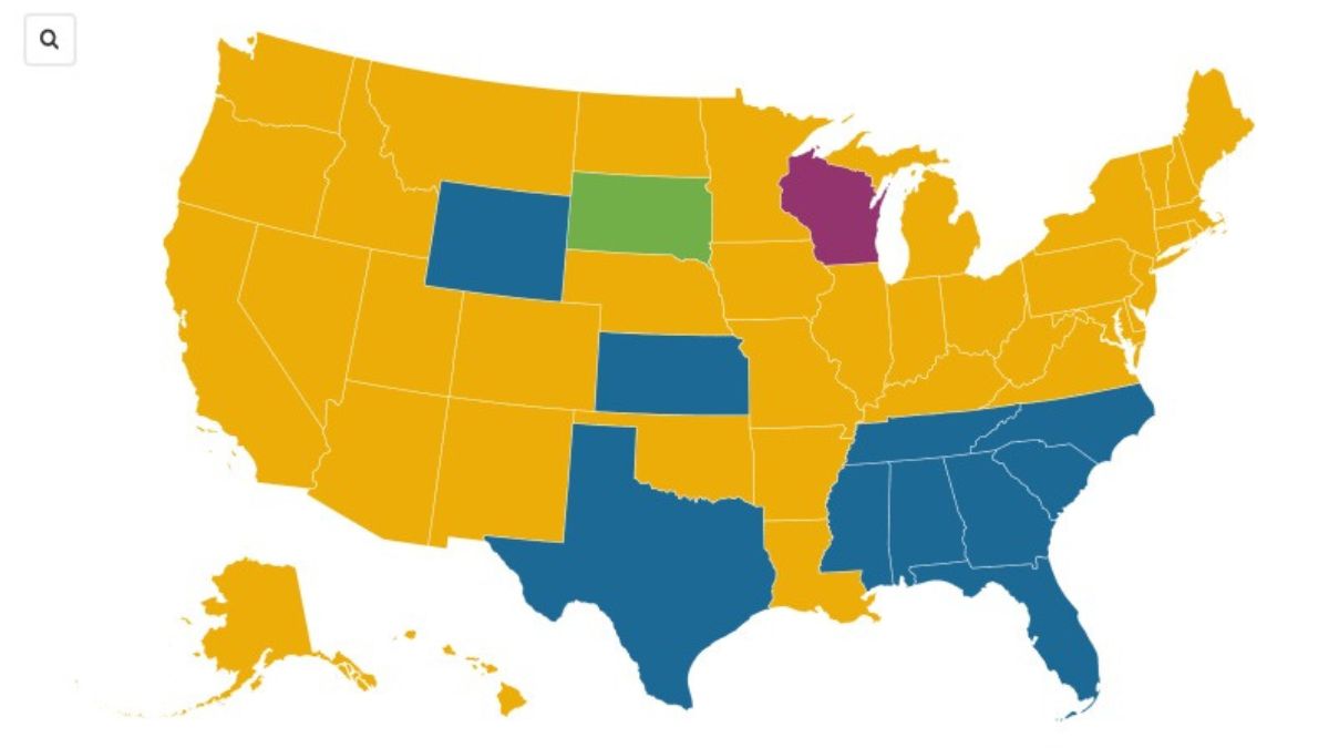 A color-coded map of the United States shows Kansas is among 11 states that have not adopted Medicaid expansion.
