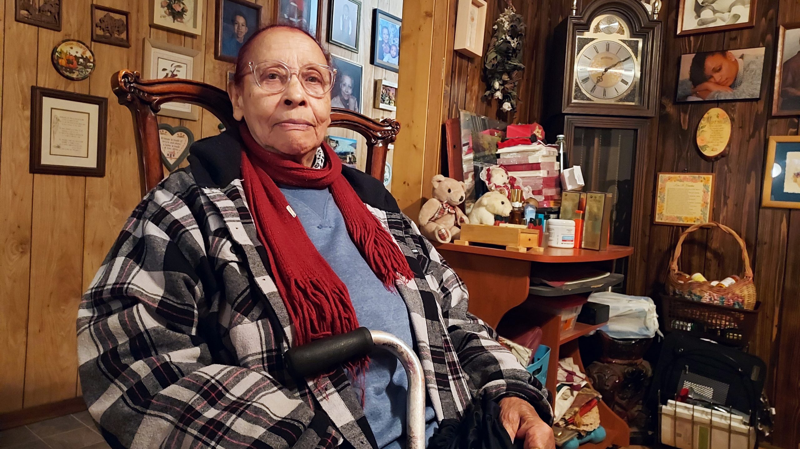 Ruby Ligon did not know of the toxic chemical in Wichita contaminating groundwater in her neighborhood. She is surrounded by photos of the family she raised in her home.