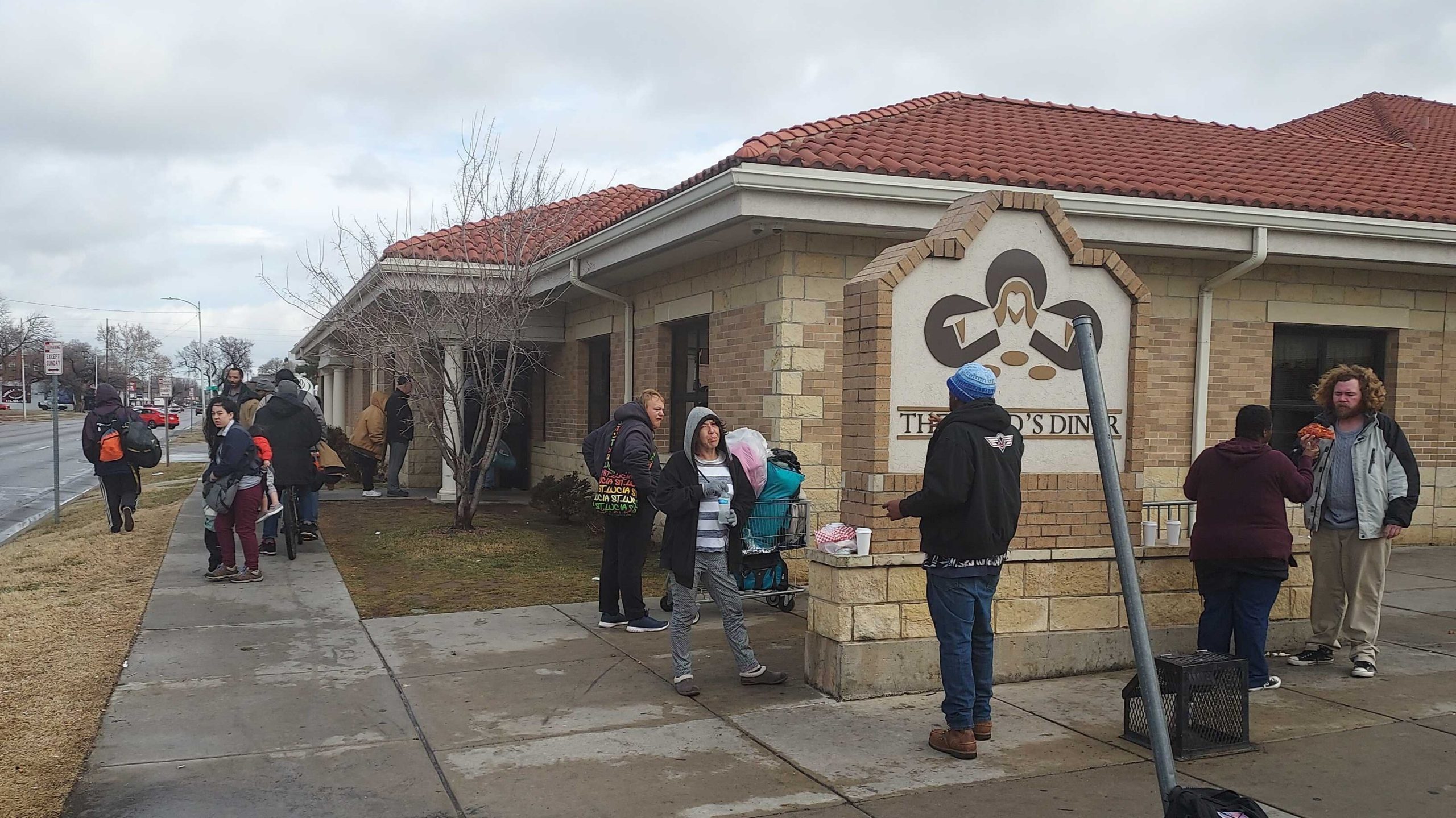 People lined up to get food at The Lord's Diner.