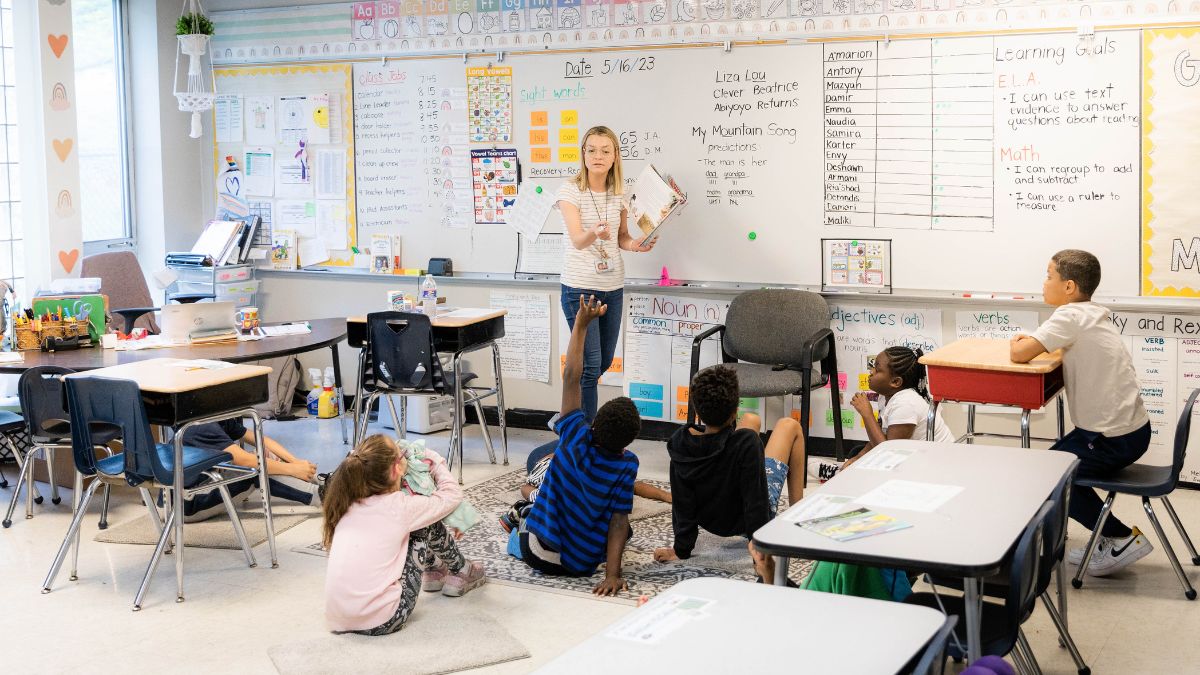 Teacher leads a classroom at Genesis School