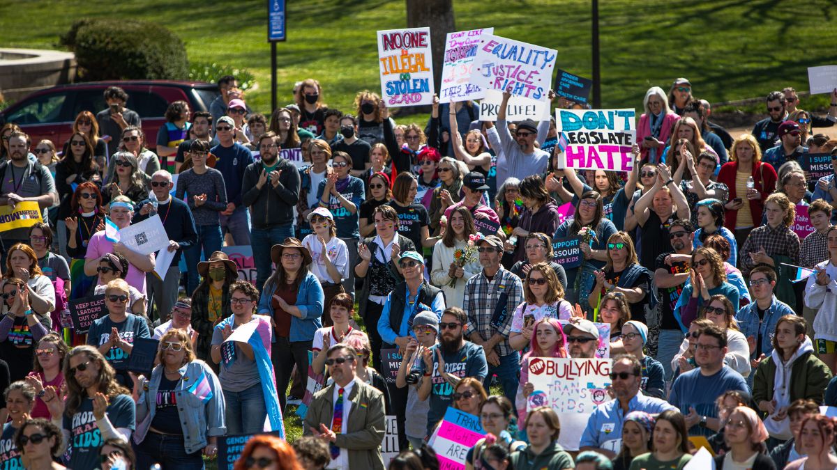 A crowd of Missourians gather at the state capitol building to protest bans on gender-affirming care.