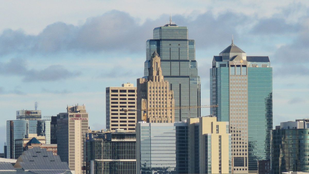The Kansas City skyline with clouds over it for a story about air quality