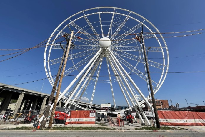 A Ferris wheel under constrruction.
