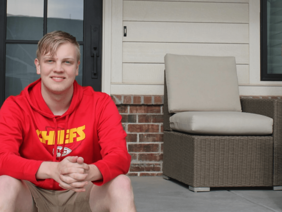 Twenty-year-old Kyle Ritterbush sitting on his front porch.