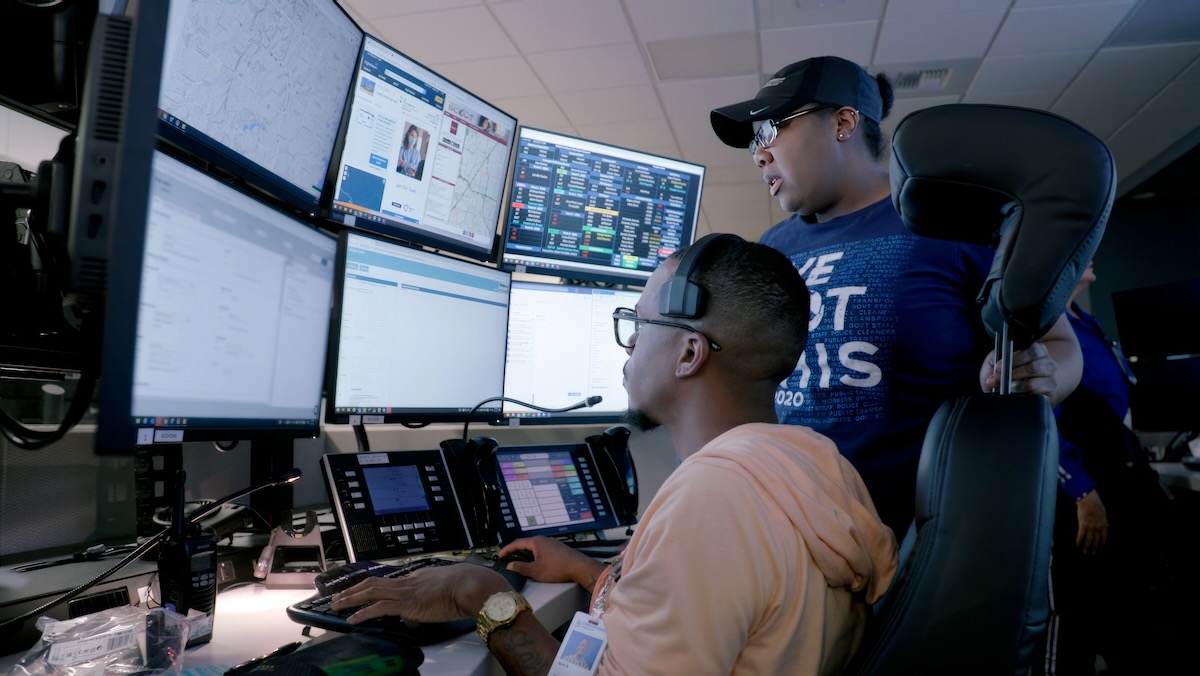 Two employees at Children's Mercy Hospital in Kansas City, Missouri, look at computers, which monitor hospital operations.