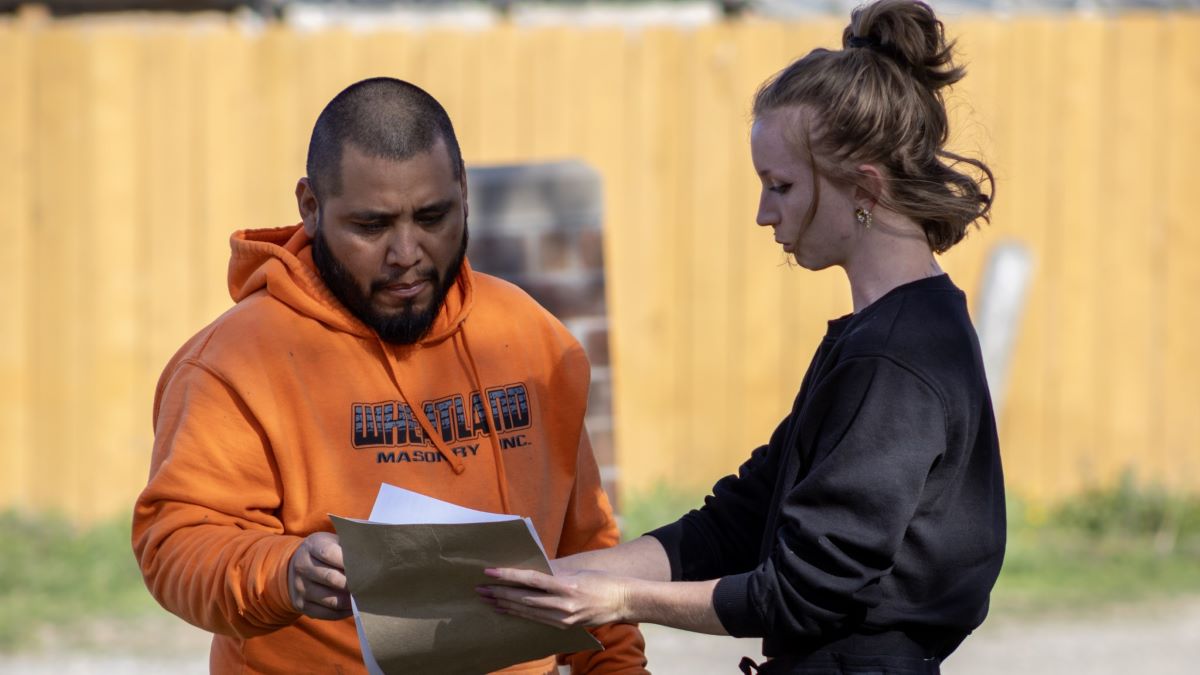 Wichita parent Ruth Lehman gathers signatures on a petition to bring the Wichita school closing plan before the Kansas State Board of Education.