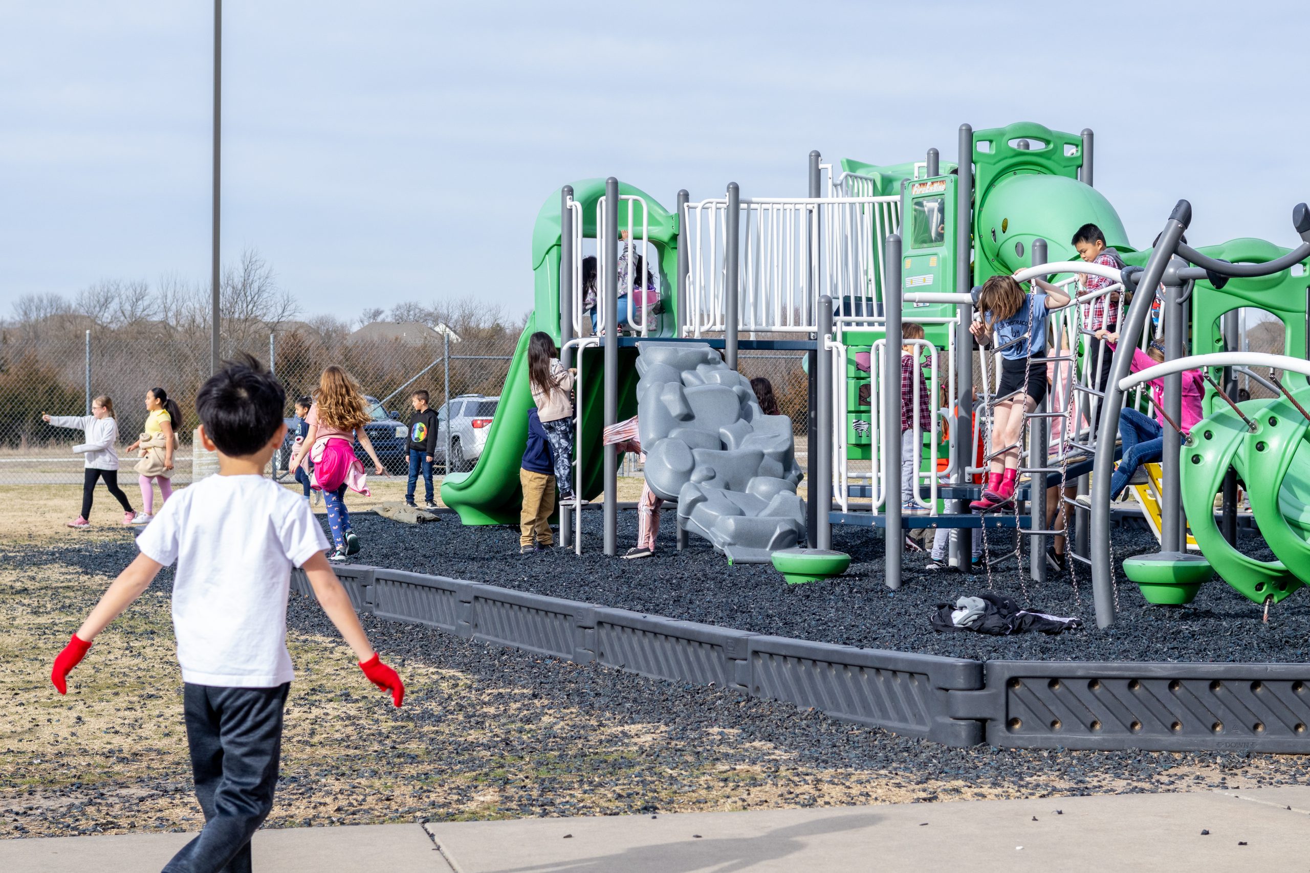 Children playing at a local playground