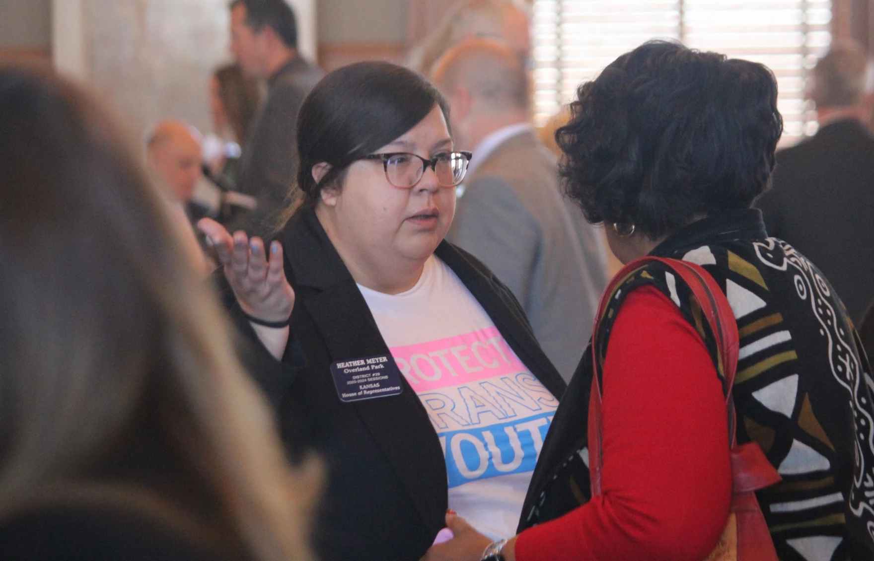 Rep. Heather Meyer talking to lawmakers last April in the House Chamber.