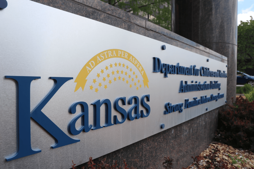 A sign outside the Department for Children and Families building.