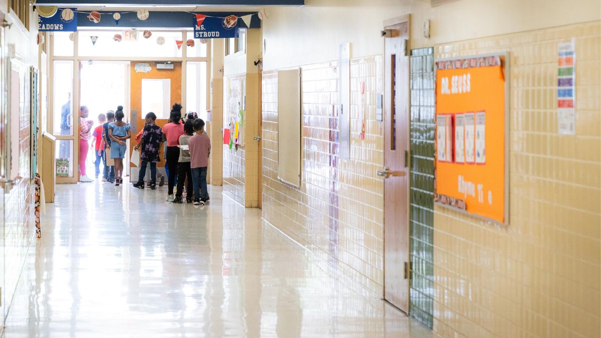 Students walk out of Melcher Elementary School, which would be affected by the KCPS bond plan