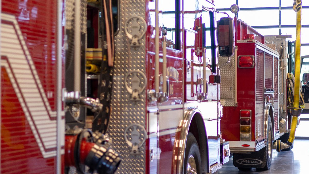 Fire trucks in a firehouse. In some Missouri counties, 911 doesn’t exist. Upgrades to Missouri’s emergency dispatching will connect them to modern technology.