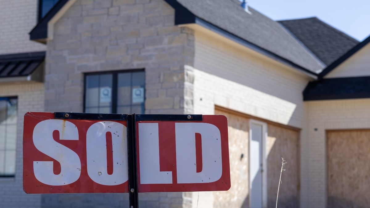 A sold sign in front of a home.