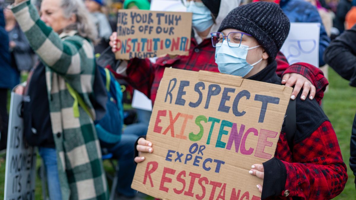 Protesters attending a recent Hands Off! rally in Kansas City.