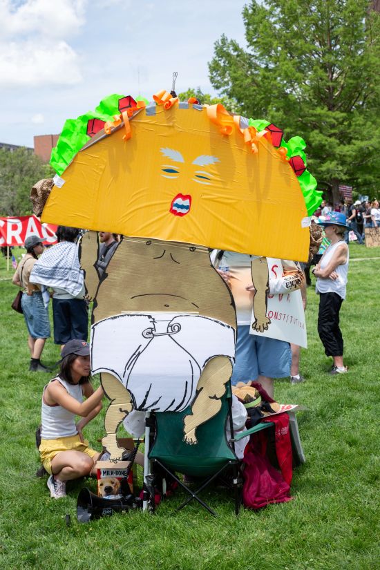 Lorie Kellogg, an Indivisible KC volunteer, gave her “Trump taco king” a taco head because “Trump always chickens out.”