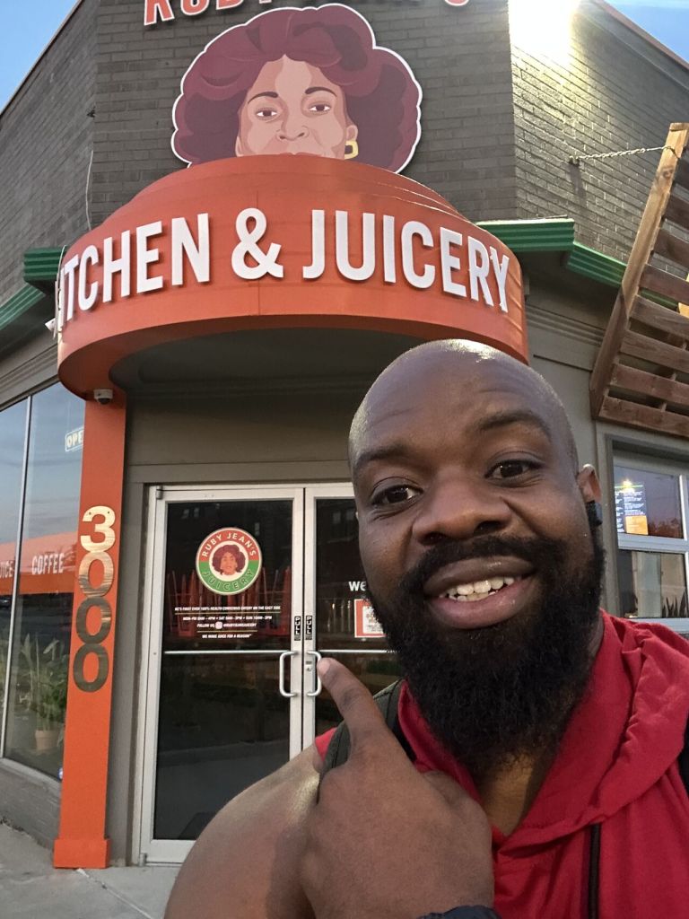 Brandon Calloway on his “Ruck Walk” outside Ruby Jean’s Kitchen & Juicery.