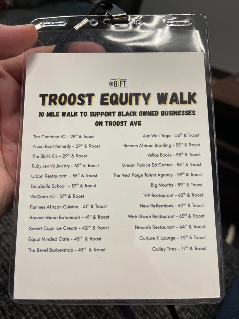 A lanyard listing of all 24 Black-owned businesses along the Troost Equity Walk.