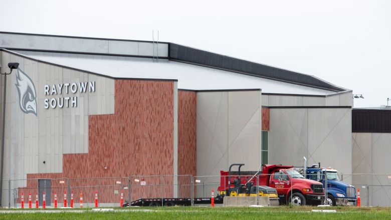 Construction equipment outside of Raytown South High School, where a gas leak below the parking lot is being repaired.