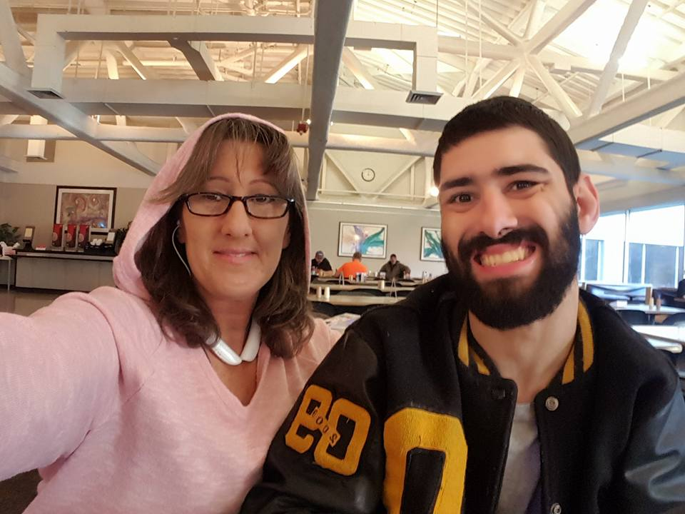 Twila Foley, left, and her son Christopher Foley, right, pose for a selfie.