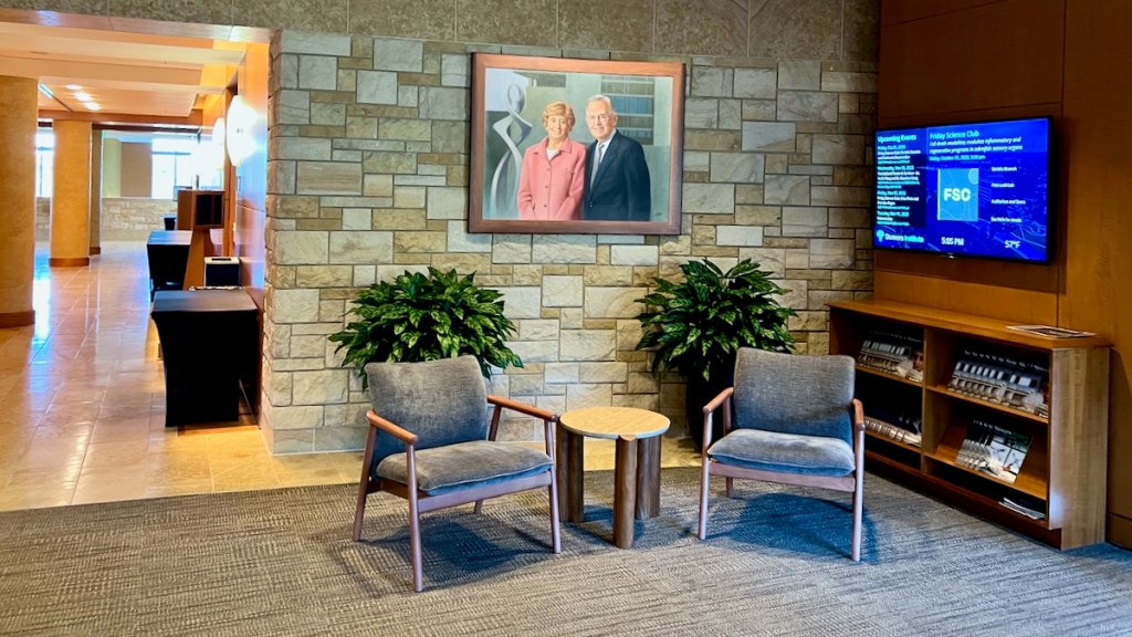 A painting of Virginia and Jim Stowers inside the lobby of the Stowers Institute for Medical Research in Kansas City.
