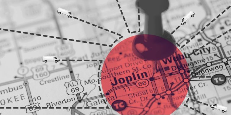 A graphic shows a map of Joplin, Missouri, with vans heading into town. Joplin and Columbia are introducing new efforts to combat growing homelessness in their cities. Experts point to the lack of resources in rural areas that pull homeless people into regional hubs.