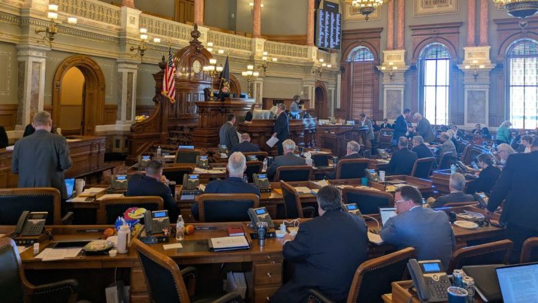 A photo of Kansas lawmakers sitting in the House Chamber