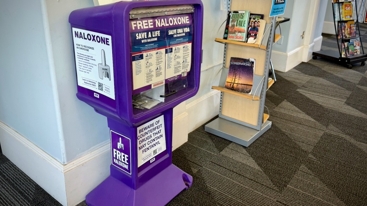 A dispensary box at the Westport Library provides free naloxone, a medication that can reverse an opioid overdose.