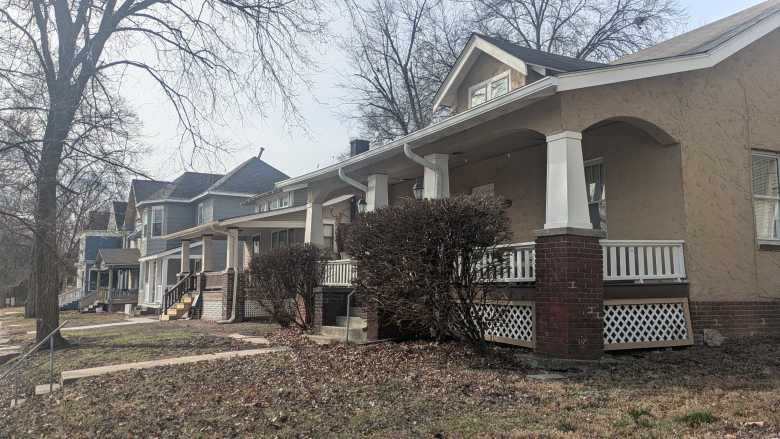 A row of houses in a suburban neighborhood.
