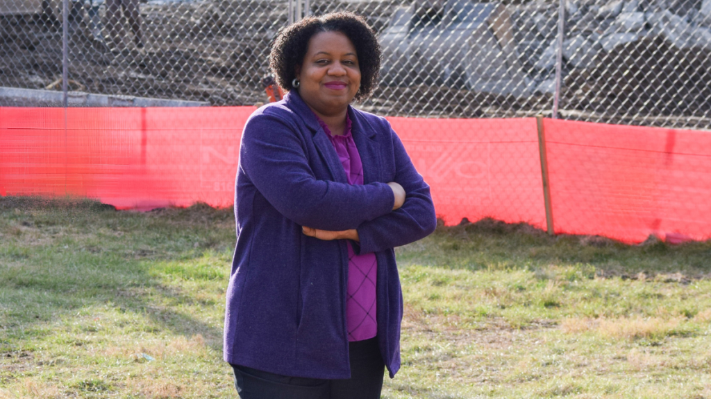 Kansas City Third District Councilwoman Melissa Robinson standing with arms crossed at a construction site.